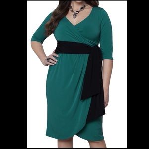 Super sexy, curve skimming faux wrap dress